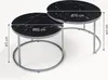 Two nesting round coffee tables with black marble-effect tops and silver metal legs, shown with dimensions indicated. Voir les images du produit