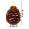 A pinecone-shaped LED candle with dimensions indicated. Produktbild-Vorschau