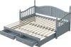 A grey daybed with two drawers pulled out, showing the slatted mattress base. Náhled obrázku produktu
