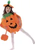A young girl wearing a pumpkin costume. Produktbild-Vorschau