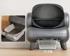 A modern automatic cat litter box is shown in a room with a close-up inset of its waste drawer. Anteprima dell’immagine prodotto