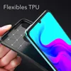 A hand holding a phone case next to a smartphone with a colorful screen. Podgląd zdjęcia produktu