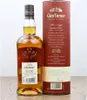 A bottle of Glen Turner Heritage Double Cask Single Malt Scotch Whisky and its cylindrical packaging are displayed on a wooden surface. Produktbild-Vorschau
