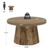 A diagram showing the dimensions of a round coffee table, with a silhouette of a person for scale. Anteprima dell’immagine prodotto