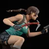 A detailed statue of Lara Croft from Tomb Raider, holding an ice axe and a pistol. Anteprima dell’immagine prodotto