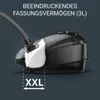 A close-up marketing image of a black vacuum cleaner, highlighting its large dust bag capacity. Produktbild-Vorschau