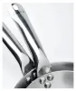 Close-up of two stainless steel pan handles attached to a pan. Podgląd zdjęcia produktu