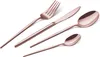 A set of rose gold cutlery, including a fork, knife, and two spoons, arranged diagonally on a white background. Anteprima dell’immagine prodotto