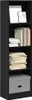 A tall, narrow black bookshelf filled with books and decorative items. Podgląd zdjęcia produktu