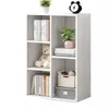 A white, open bookshelf with several compartments, displaying books, a teddy bear, and decorative items. Náhled obrázku produktu