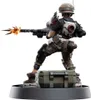 A figurine of a soldier firing a weapon, standing on a crate. Náhled obrázku produktu
