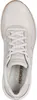A top-down view of a beige sneaker. Voir les images du produit
