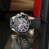 A close-up shot of a Jaguar chronograph watch with a black dial and rose gold accents, placed on a reflective black surface. Produktbild-Vorschau
