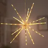 A star-shaped LED light fixture hangs against a blurred background. Produktbild-Vorschau