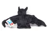 A black plush bat toy is shown from the back with its wings spread. Produktbild-Vorschau
