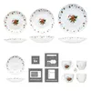 A collage of Christmas-themed tableware with gingerbread man motifs, including plates, bowls, and cups, along with icons indicating product suitability for dishwashers, microwaves, and refrigerators. Náhled obrázku produktu