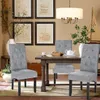 A dining room setting with chairs around a table. Produktbild-Vorschau