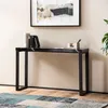 A console table with books and a pen holder on it, placed in a room with a painting on the wall and a rug on the floor. Produktbild-Vorschau