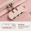A close-up of a pink combination lock on a pink suitcase. Náhľad obrázku produktu