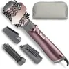 A hair styling tool with multiple attachments and a storage bag, displayed against a white background. Podgląd zdjęcia produktu