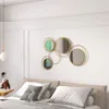 A bedroom scene with a bed and wall decor. Produktbild-Vorschau