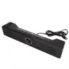 A black computer soundbar is shown against a white background. Voir les images du produit