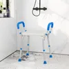 A shower chair is placed in a shower stall with white tiled walls and a patterned floor. Podgląd zdjęcia produktu