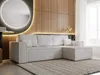 A modern living room with a light gray sectional sofa, a large round mirror with backlighting, and wood-paneled walls. Produktbild-Vorschau