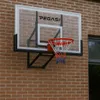 A basketball backboard mounted on a brick wall. Produktbild-Vorschau