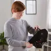 A young boy holding a Darth Vader mask. Anteprima dell’immagine prodotto