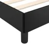 A close-up view of the corner of a black bed frame with wooden slats visible inside. Produktbild-Vorschau