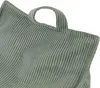 A close-up view of a green corduroy beanbag chair. Produktbild-Vorschau