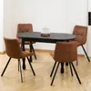 A dining set with an oval table and four chairs in a room. Podgląd zdjęcia produktu