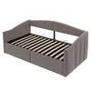 A gray upholstered daybed with a slatted mattress base is shown against a white background. Anteprima dell’immagine prodotto