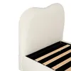 Close-up view of the headboard and base of a bed. Anteprima dell’immagine prodotto