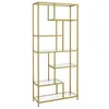 A tall, narrow gold-colored bookshelf with clear glass shelves against a white background. Náhled obrázku produktu