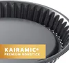 Close-up of the fluted edge and interior of a non-stick baking pan. Náhled obrázku produktu