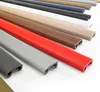 Multiple colored handrails are arranged in a diagonal line against a white background. Produktbild-Vorschau
