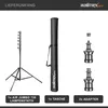 A product shot showing a lamp stand, a carrying bag, and adapters, with text labels indicating the items. Podgląd zdjęcia produktu