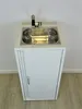 A white cabinet with a stainless steel sink and faucet. Podgląd zdjęcia produktu