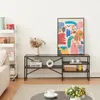 A living room scene with a TV stand, artwork, and a sofa. Anteprima dell’immagine prodotto