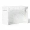 A white kitchen island with a marble pattern, shown from a side angle against a white background. Náhled obrázku produktu