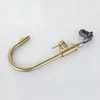 A gold-colored kitchen faucet is shown against a plain white background. Náhled obrázku produktu