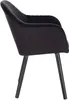 A side view of a black velvet armchair with black metal legs, isolated on a white background. Produktbild-Vorschau