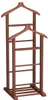 A wooden valet stand with two hangers and multiple shelves. Produktbild-Vorschau