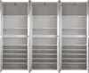 An empty white wardrobe with multiple shelves and open doors. Produktbild-Vorschau