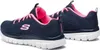 A pair of navy and pink Skechers athletic shoes are shown from a side-angle on a white background. Voir les images du produit