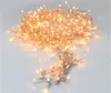 A tangled string of warm white LED lights on a white background. Produktbild-Vorschau