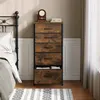 A bedroom scene with a dresser, bed, and rug. Produktbild-Vorschau