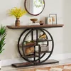 A console table with shelves is decorated with various items, including a vase of yellow flowers, books, and decorative objects. Anteprima dell’immagine prodotto